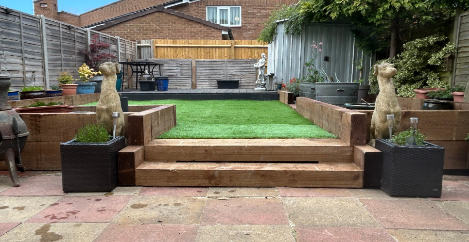 Green garden landscape with handyperson van in the background for Safe and Healthy Homes